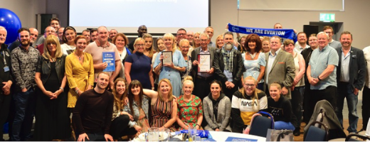 Everton in the Community receiving their Investing in Volunteers Award